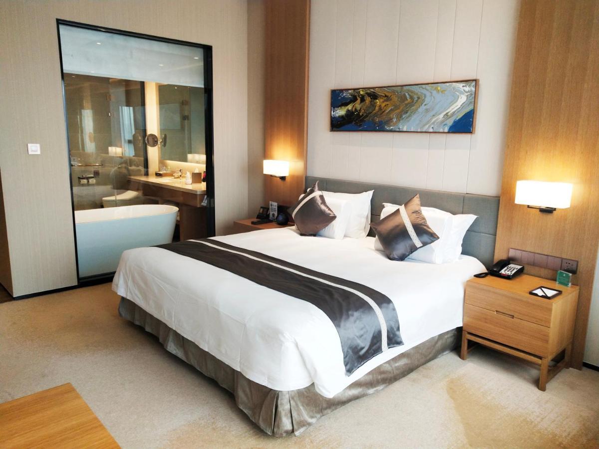 Yuyao Bright Hotel Bagian luar foto