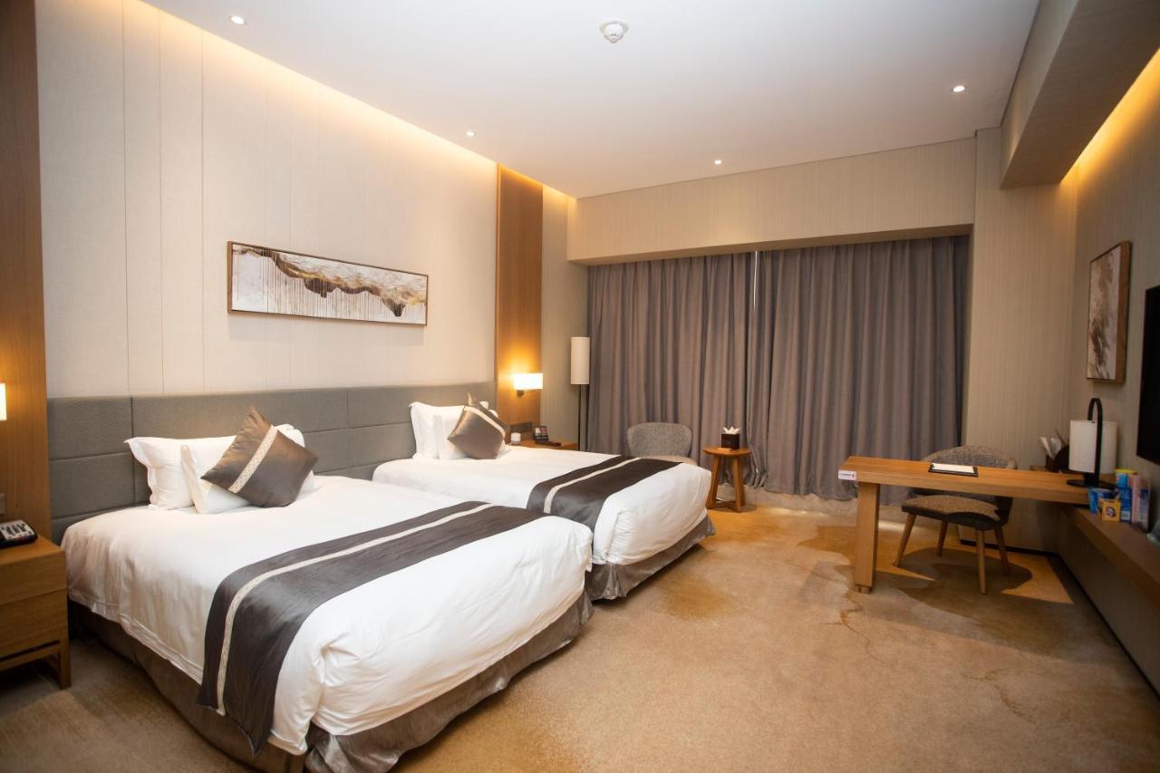 Yuyao Bright Hotel Bagian luar foto